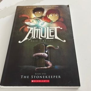 Amulet book Number 1 The Stonekeeper by Kazu Kibuishi Top corner bent